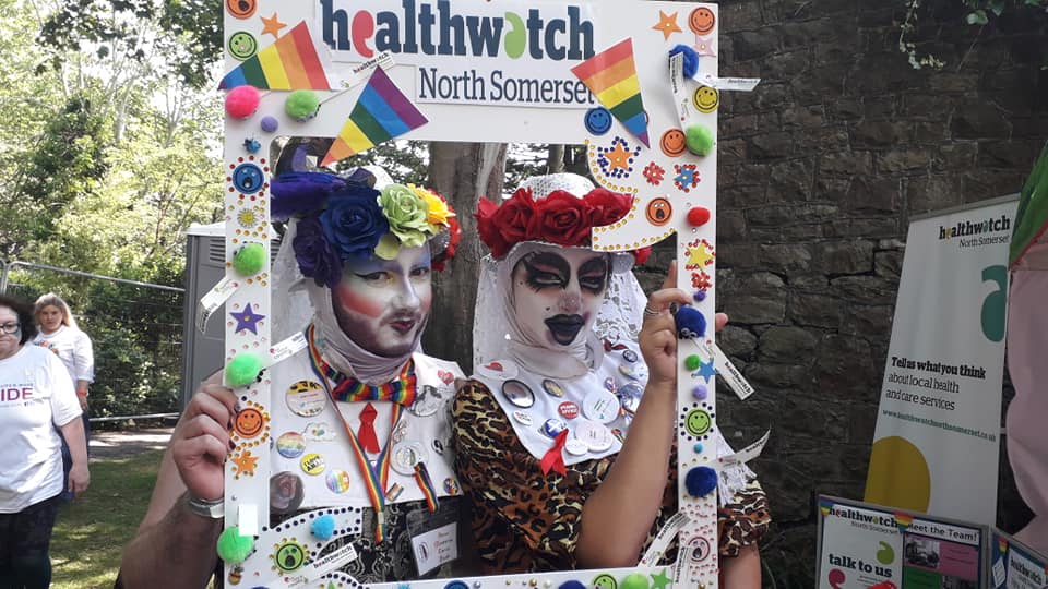 Pride marcher holding selfie frame