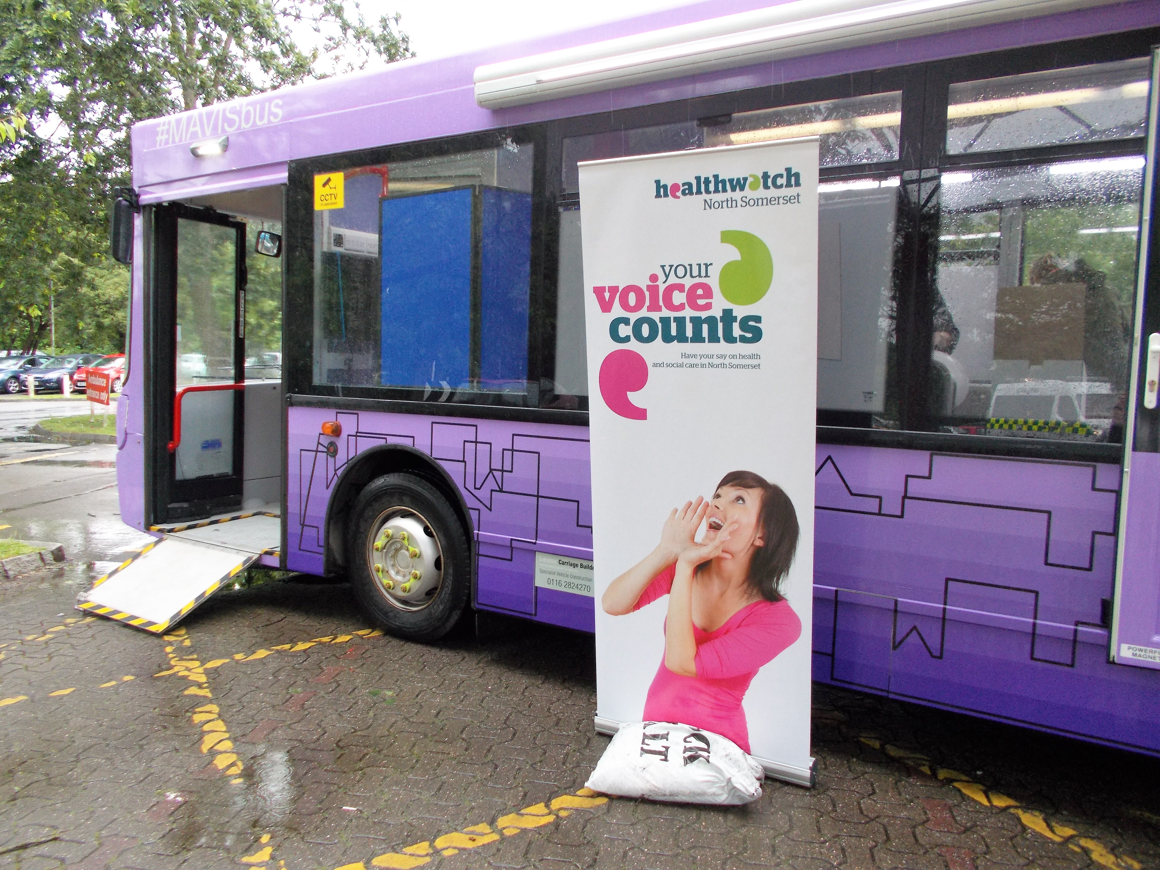Volunteers sitting on the engagement bus