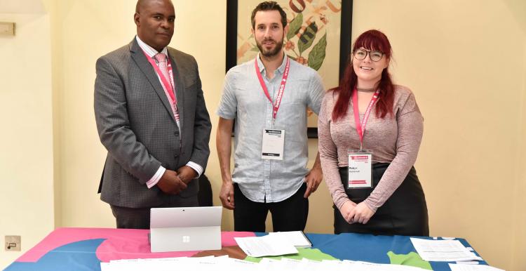Staff at an indoor Healthwatch event