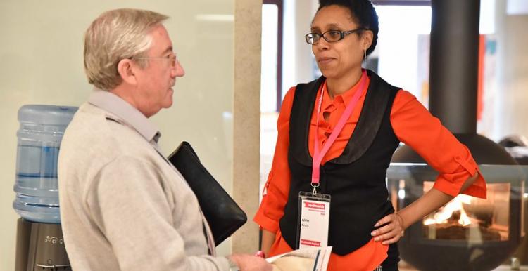 woman and gentleman having a discussion in a hospital