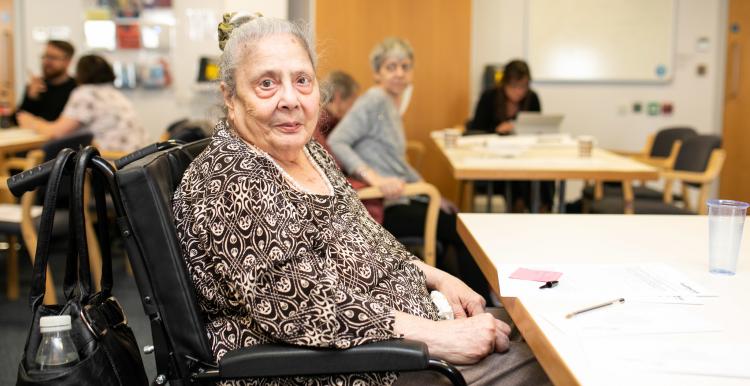 Elderly woman sitting in a wheelchair