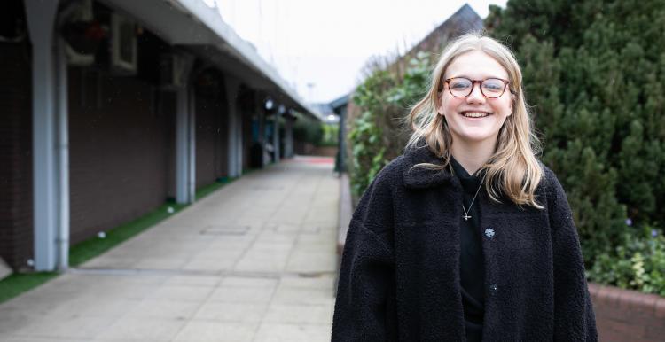 Young woman smiling at the camera 