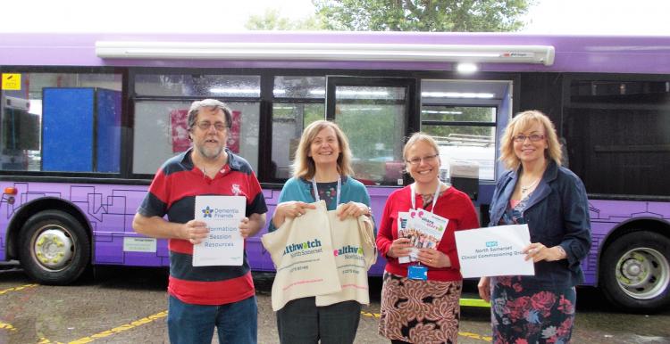 Healthwatch volunteers in front of the MAVIS bus