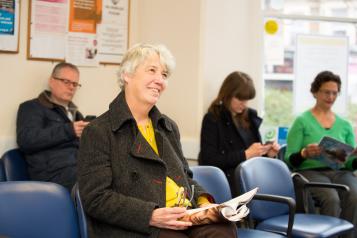 Woman sat in a waiting room