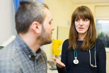 General Practitioner talking to a patient
