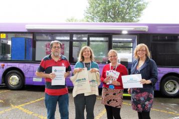 Healthwatch volunteers in front of the MAVIS bus