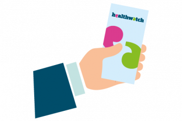 Hand holding a Healthwatch leaflet