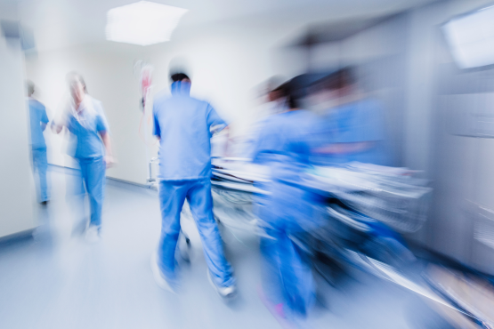 Blurred emergency scene in a hospital.