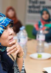 Healthwatch staff sat round a table