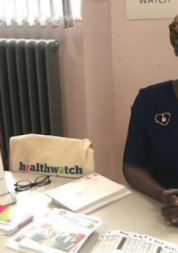 Bristol Area Lead Acomo sitting at a table